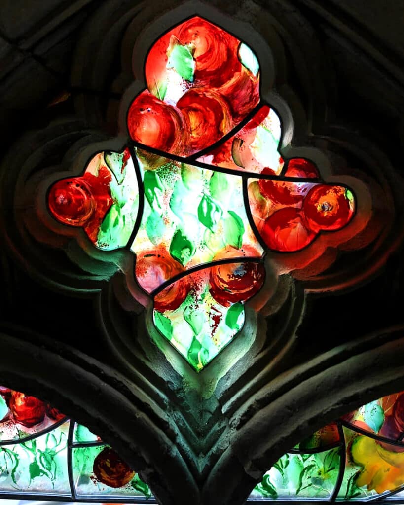 Detail from The Damson Tree window – The Cloisters at Canterbury Cathedral. Designed by Hughie O’donoghue and created/translated into glass by Grace – Artists in Collaboration